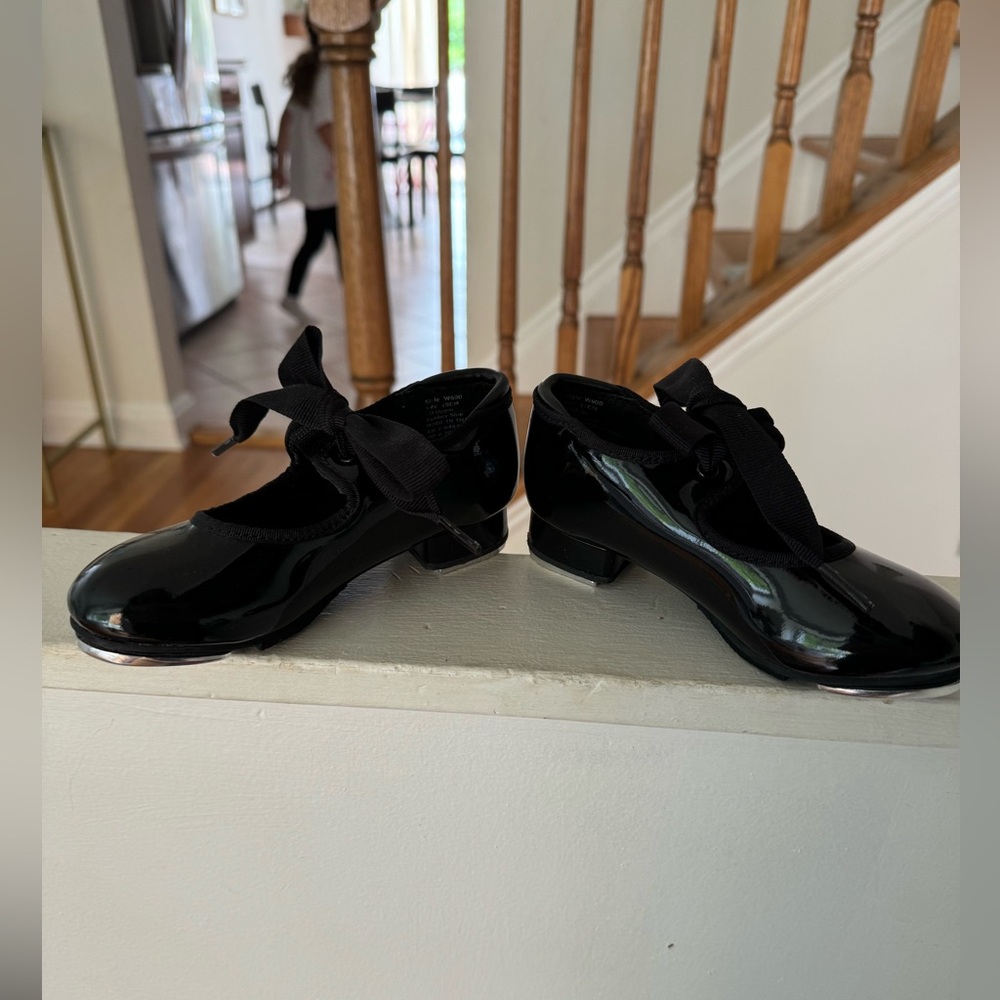 Tap shoes, barely worn. For dance class.